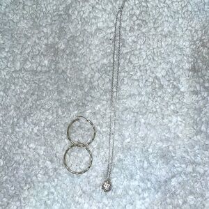Silver Neckless and earrings.